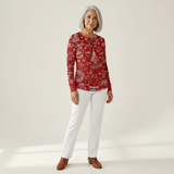 Charline - Pull de Noël rouge à motifs blancs