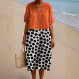Pénélope - Robe Orange avec Points Contrastants