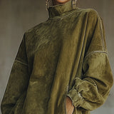 Gabrielle - Robe avec col haut et franges
