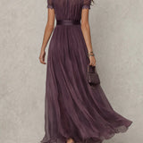 Flavie - Robe longue violette avec décolleté